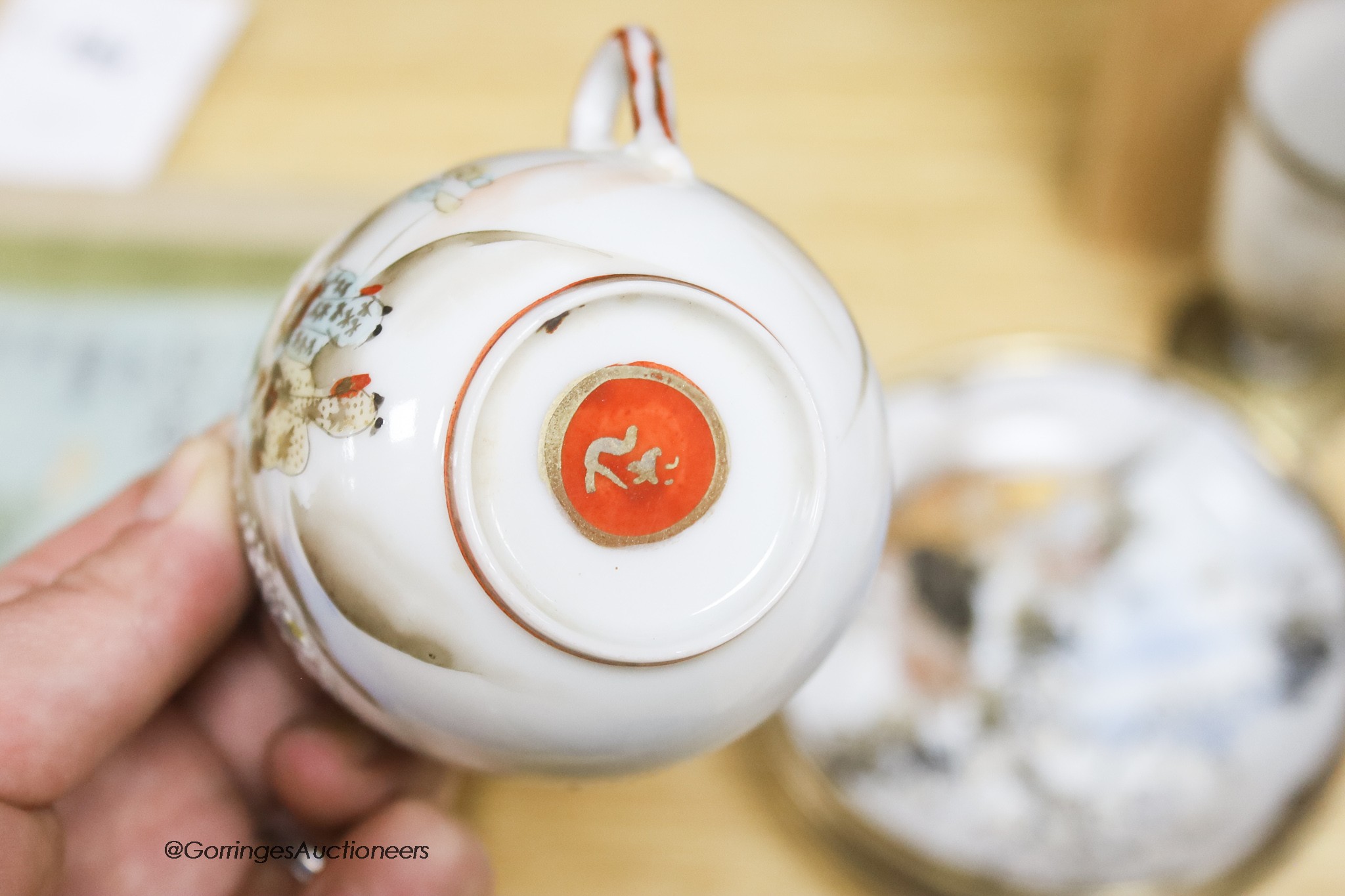 A group of various Japanese Meiji period cup and saucers